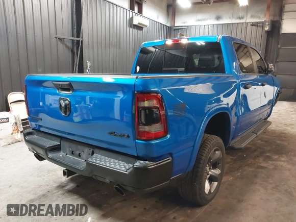 2023 Ram 1500 Big Horn with VIN 1C6SRFFT1PN523907, listed as a IAAI auction lot 41622565 with 24,196 mi miles and . Bid and sale history available at DreamBid. Image 4.