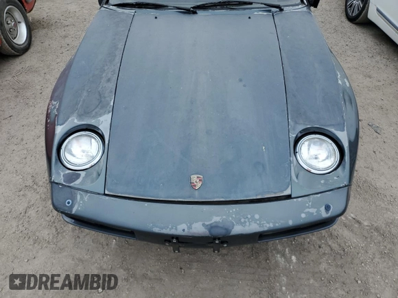 1981 Porsche 928 z VIN WP0JA0929BS820364, wystawiony jako Copart lot #76286414 z przebiegiem 40 205 mil mil oraz Szkoda całkowita • Salvage title. Historia ofert i sprzedaży dostępna na DreamBid. Obrazek 11.