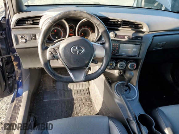 2013 Scion tC z VIN JTKJF5C78D3050747, wystawiony jako Copart lot #50610645 z przebiegiem 92 004 mil mil oraz Szkody całkowita. Historia ofert i sprzedaży dostępna na DreamBid. Obrazek 8.