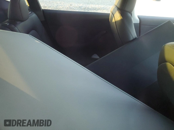 2023 Tesla Model Y Long Range z VIN 7SAYGDEE1PA078373, wystawiony jako Copart lot #48169175 z przebiegiem Nie podano mil oraz Szkoda całkowita • Salvage title. Historia ofert i sprzedaży dostępna na DreamBid. Obrazek 12.