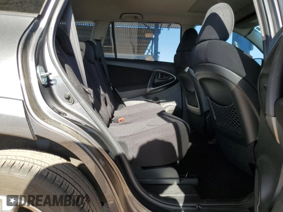 2010 Toyota RAV4 Sport with VIN JTMWK4DV9AD003233, listed as a Copart auction lot 53918805 with 147,127 mi miles and Salvage title. Bid and sale history available at DreamBid. Image 11.