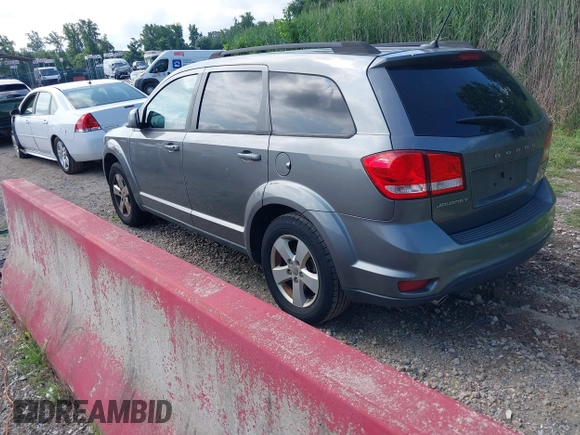 2012 Dodge Journey SXT with VIN 3C4PDCBG3CT310679, listed as a IAAI auction lot 42731771 with 165,928 mi miles and . Bid and sale history available at DreamBid. Image 3.