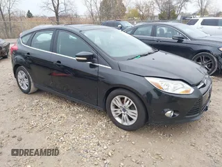 2012 Ford Focus SEL with VIN 1FAHP3M28CL336001, listed as a IAAI auction lot 40876771 with 147,017 mi miles. Bid and sale history available at carsss.com. Image 1.