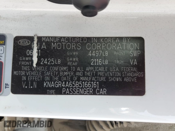 2011 Kia Optima SX z VIN KNAGR4A65B5166161, wystawiony jako Copart lot #56749455 z przebiegiem 213 574 mil mil oraz Szkoda całkowita • Salvage title. Historia ofert i sprzedaży dostępna na DreamBid. Obrazek 13.