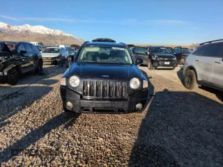 2009 Jeep Compass North with VIN 1J4FT47B89D189562, listed as a Copart auction lot 48285415 with 89,377 mi miles and Salvage Title. Bid and sale history available at carsss.com. Image 5.