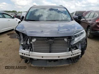 2022 Honda Pilot Touring 7-Passenger with VIN 5FNYF6H6XNB014347, listed as a Copart auction lot 56869745 with 31,513 mi miles and Salvage title. Bid and sale history available at DreamBid. Image 5.