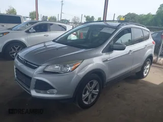 2013 Ford Escape SE with VIN 1FMCU0GX5DUB97293, listed as a IAAI auction lot 42044696 with 182,746 mi miles and . Bid and sale history available at DreamBid. Image 2.