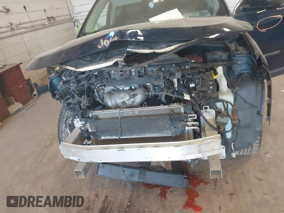 2020 Jeep Compass Latitude with VIN 3C4NJDBB7LT157086, listed as a IAAI auction lot 41263623 with 103,783 mi miles and . Bid and sale history available at DreamBid. Image 6.