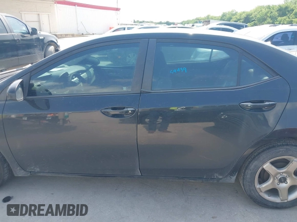 2015 Toyota Corolla L with VIN 5YFBURHE7FP255910, listed as a IAAI auction lot 42132289 with 97,635 mi miles and . Bid and sale history available at DreamBid. Image 14.