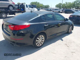 2014 Kia Optima EX with VIN 5XXGN4A72EG294381, listed as a IAAI auction lot 41944473 with 119,781 mi miles and . Bid and sale history available at carsss.com. Image 4.