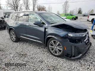 2021 Cadillac XT6 Premium Luxury with VIN 1GYKPFRS8MZ132642, listed as a Copart auction lot 77756874 with 33,415 mi miles and Non repairable. Bid and sale history available at DreamBid. Image 4.