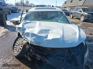 2016 Volkswagen Passat 1.8T SE w/Technology with VIN 1VWBS7A36GC020005, listed as a IAAI auction lot 41640152 with 1 mi miles. Bid and sale history available at carsss.com. Image 13.