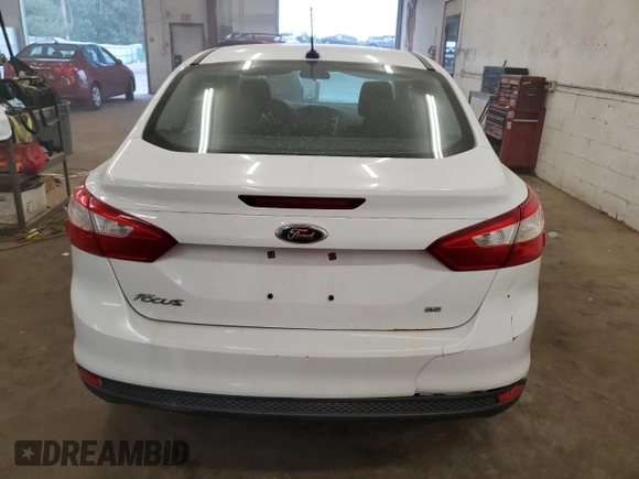2012 Ford Focus SE with VIN 1FAHP3F23CL236482, listed as a Copart auction lot 62279735 with 127,239 mi miles and Salvage title. Bid and sale history available at DreamBid. Image 6.