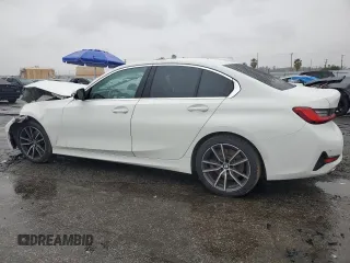 2021 BMW 3 Series 330i with VIN 3MW5R1J0XM8B48990, listed as a Copart auction lot 49277185 with 69,776 mi miles and Salvage Title. Bid and sale history available at carsss.com. Image 2.
