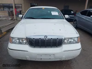 2002 Mercury Grand Marquis GS with VIN 2MEFM74W82X628008, listed as a IAAI auction lot 41576839 with 157,874 mi miles. Bid and sale history available at carsss.com. Image 6.