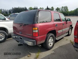 2004 Chevrolet Tahoe LS with VIN 1GNEC13V04R132890, listed as a Copart auction lot 56128195 with 174,907 mi miles and Clean title. Bid and sale history available at DreamBid. Image 3.