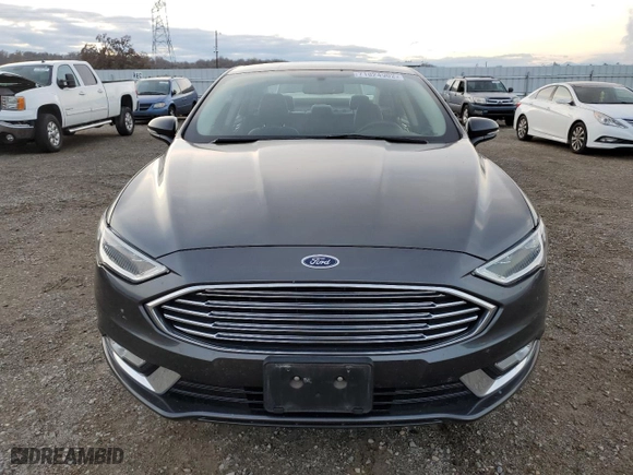 2017 Ford Fusion Energi SE with VIN 3FA6P0PU3HR354658, listed as a Copart auction lot 71824902 with 67,618 mi miles. Bid and sale history available at carsss.com. Image 5.