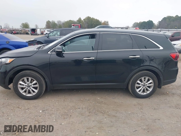 2019 Kia Sorento LX with VIN 5XYPG4A34KG579484, listed as a IAAI auction lot 40971250 with 142,327 mi miles. Bid and sale history available at carsss.com. Image 14.