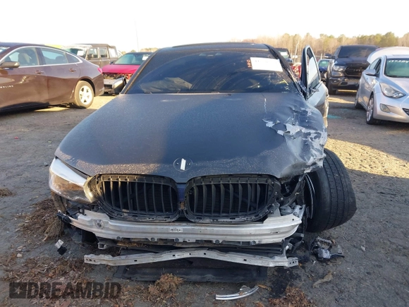 2019 BMW 5 Series M550i xDrive with VIN WBAJB9C50KB464159, listed as a IAAI auction lot 41758879 with 9,000 mi miles and . Bid and sale history available at DreamBid. Image 13.