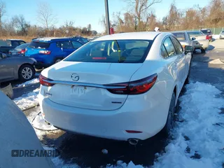 2021 Mazda 6 Sport with VIN JM1GL1UM8M1612598, listed as a IAAI auction lot 41277726 with 19,415 mi miles and . Bid and sale history available at carsss.com. Image 16.