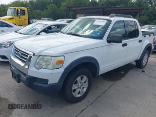 2007 Ford Explorer Sport Trac XLT z VIN 1FMEU31K07UB56341, wystawiony jako IAAI lot #42646998 z przebiegiem 132 347 mil mil oraz . Historia ofert i sprzedaży dostępna na DreamBid. Obrazek 2.