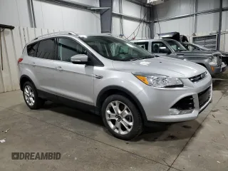 2016 Ford Escape Titanium with VIN 1FMCU9J95GUC27654, listed as a Copart auction lot 51950575 with 101,220 mi miles and Salvage Title. Bid and sale history available at carsss.com. Image 4.