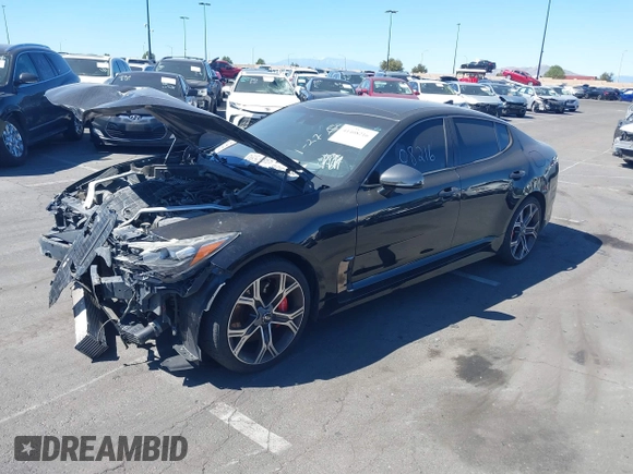 2018 Kia Stinger GT2 with VIN KNAE55LC9J6016753, listed as a IAAI auction lot 41408216 with 117,268 mi miles. Bid and sale history available at carsss.com. Image 2.