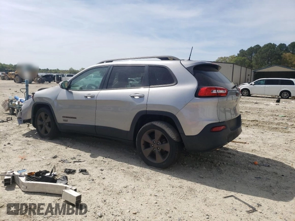 2016 Jeep Cherokee 75th Anniversary with VIN 1C4PJLCB5GW256619, listed as a Copart auction lot 53648575 with 98,969 mi miles and Salvage Title. Bid and sale history available at DreamBid. Image 2.