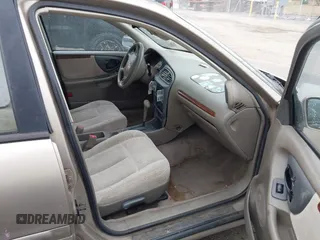 1999 Oldsmobile Cutlass GL z VIN 1G3NB52J8X6318863, wystawiony jako IAAI lot #41490091 z przebiegiem 106 821 mil mil oraz . Historia ofert i sprzedaży dostępna na DreamBid. Obrazek 5.