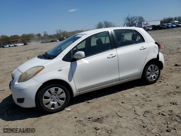 2009 Toyota Yaris with VIN JTDKT903695248767, listed as a Copart auction lot 52327265 with 211,184 mi miles and Salvage Title. Bid and sale history available at carsss.com. Image 1.