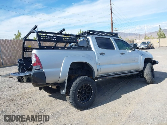 2013 Toyota Tacoma with VIN 5TFLU4EN2DX049615, listed as a IAAI auction lot 41893876 with 160,752 mi miles and . Bid and sale history available at DreamBid. Image 4.