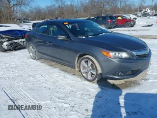 2014 Acura ILX Premium Pkg with VIN 19VDE1F56EE006775, listed as a IAAI auction lot 41613338 with 136,288 mi miles. Bid and sale history available at carsss.com. Image 1.