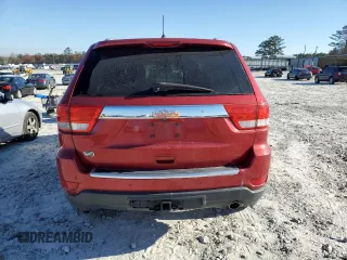 2011 Jeep Grand Cherokee Overland with VIN 1J4RS6GG7BC665979, listed as a Copart auction lot 83394214 with 216,988 mi miles and Salvage Title. Bid and sale history available at DreamBid. Image 6.