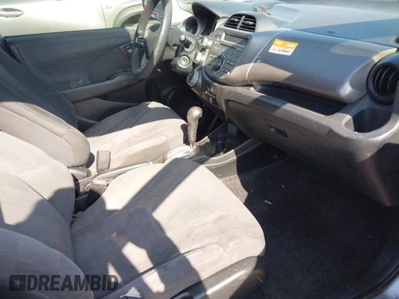 2009 Honda Fit with VIN JHMGE88239S025012, listed as a IAAI auction lot 42584028 with 163,965 mi miles and . Bid and sale history available at DreamBid. Image 5.