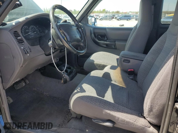 1999 Ford Ranger XLT with VIN 1FTZR15X8XTB13048, listed as a Copart auction lot 53948805 with 154,436 mi miles and Salvage title. Bid and sale history available at DreamBid. Image 7.