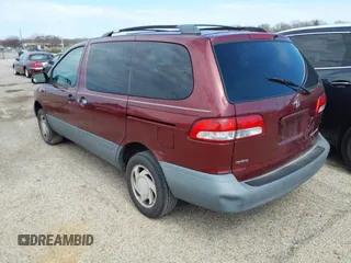 2001 Toyota Sienna LE with VIN 4T3ZF13C91U350273, listed as a IAAI auction lot 41880749 with 289,542 mi miles. Bid and sale history available at carsss.com. Image 3.