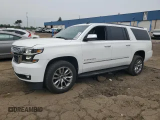 2015 Chevrolet Suburban LT z VIN 1GNSKJKC5FR261474, wystawiony jako Copart lot #60679775 z przebiegiem 128 851 mil mil oraz Czysty tytuł • Clean title. Historia ofert i sprzedaży dostępna na DreamBid. Obrazek 1.
