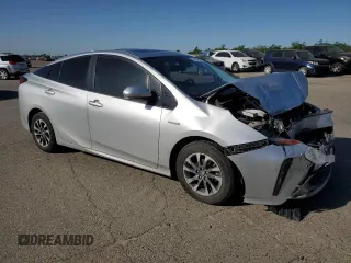 2020 Toyota Prius L Eco z VIN JTDKARFU1L3122471, wystawiony jako Copart lot #54164935 z przebiegiem 130 642 mil mil oraz Szkoda całkowita • Salvage title. Historia ofert i sprzedaży dostępna na DreamBid. Obrazek 4.