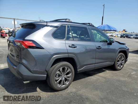 2023 Toyota RAV4 Hybrid XLE Premium z VIN JTMB6RFV5PD080395, wystawiony jako Copart lot #54899515 z przebiegiem 9 190 mil mil oraz Szkoda całkowita • Salvage title. Historia ofert i sprzedaży dostępna na DreamBid. Obrazek 3.