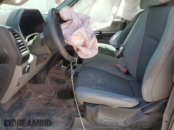 2018 Ford F-150 XL with VIN 1FTEX1CB1JKC58165, listed as a Copart auction lot 61529075 with 105,771 mi miles and Salvage title. Bid and sale history available at DreamBid. Image 7.