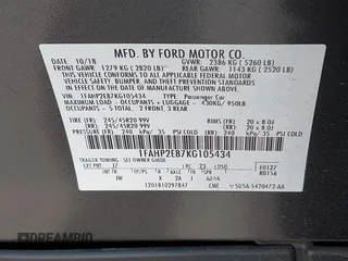 2019 Ford Taurus SEL with VIN 1FAHP2E87KG105434, listed as a IAAI auction lot 41365944 with 54,650 mi miles and . Bid and sale history available at carsss.com. Image 9.