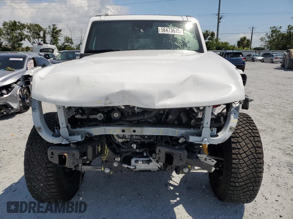 2023 Ford Bronco z VIN 1FMEE5DP5PLB73657, wystawiony jako Copart lot #58473675 z przebiegiem 14 209 mil mil oraz Szkoda całkowita • Salvage title. Historia ofert i sprzedaży dostępna na DreamBid. Obrazek 5.