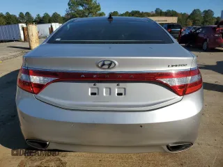2014 Hyundai Azera Limited z VIN KMHFH4JG3EA360317, wystawiony jako Copart lot #79748564 z przebiegiem Nie podano mil oraz Szkoda całkowita • Salvage title. Historia ofert i sprzedaży dostępna na DreamBid. Obrazek 6.