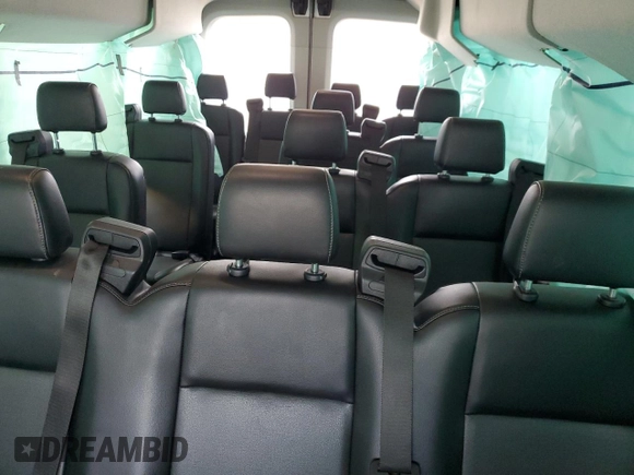 2021 Ford Transit Passenger XL z VIN 1FBAX9C82MKA89042, wystawiony jako Copart lot #74293364 z przebiegiem 5 481 mil mil oraz Szkoda całkowita • Salvage title. Historia ofert i sprzedaży dostępna na DreamBid. Obrazek 10.