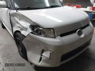 2014 Scion xB with VIN JTLZE4FE1EJ060281, listed as a IAAI auction lot 41477386 with 61,423 mi miles. Bid and sale history available at carsss.com. Image 6.