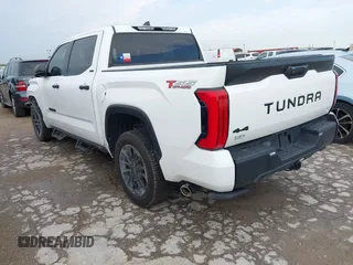 2023 Toyota Tundra SR5 with VIN 5TFLA5DB0PX077679, listed as a IAAI auction lot 42354545 with 31,838 mi miles and . Bid and sale history available at DreamBid. Image 3.