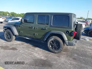 2021 Jeep Wrangler Unlimited 80th Anniversary with VIN 1C4HJXDN6MW685090, listed as a IAAI auction lot 41816088 with 31,546 mi miles and . Bid and sale history available at DreamBid. Image 3.