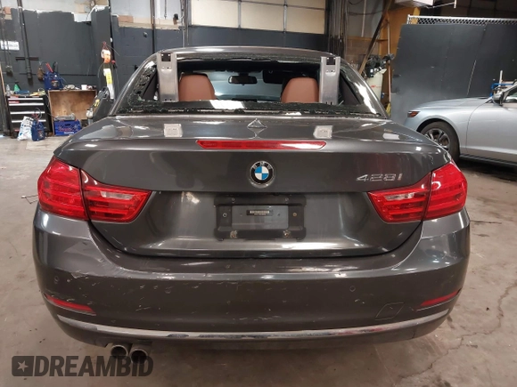 2014 BMW 4 Series 428i xDrive with VIN WBA3T1C59EPS98299, listed as a IAAI auction lot 41741235 with 93,000 mi miles and . Bid and sale history available at carsss.com. Image 16.