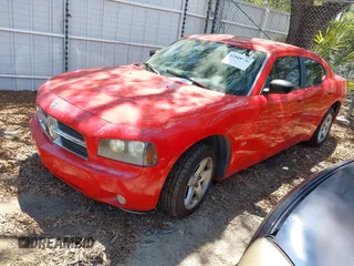 2009 Dodge Charger SXT with VIN 2B3KA33V49H556093, listed as a IAAI auction lot 42048956 with 164,284 mi miles. Bid and sale history available at carsss.com. Image 2.