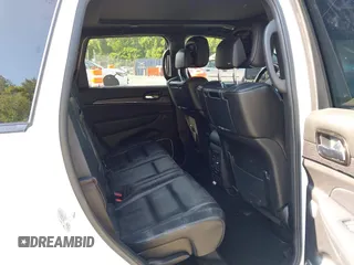 2021 Jeep Grand Cherokee Overland with VIN 1C4RJFCG3MC502165, listed as a IAAI auction lot 42404863 with 100,197 mi miles and . Bid and sale history available at DreamBid. Image 8.